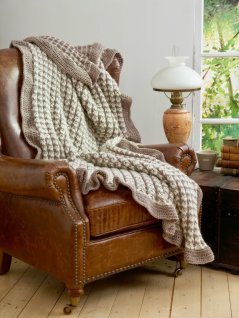 Mønstret strikket teppe