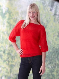 Damegenser med kabelstrikking på tvers