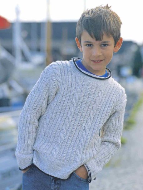 Ribbstickad jumper med flätor