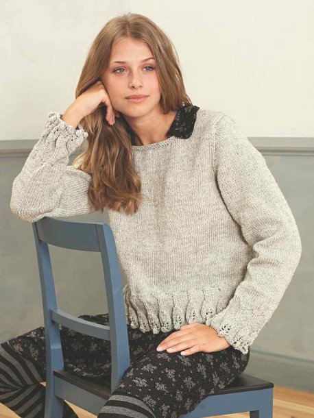 Genser med mønstret kant