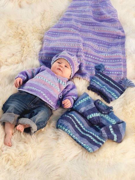 Pakk inn cardigan, genser, luer og teppe