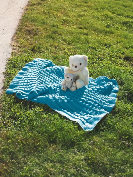 Plisseret strikket babyteppe