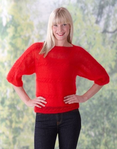 Damegenser med kabelstrikk på tvers